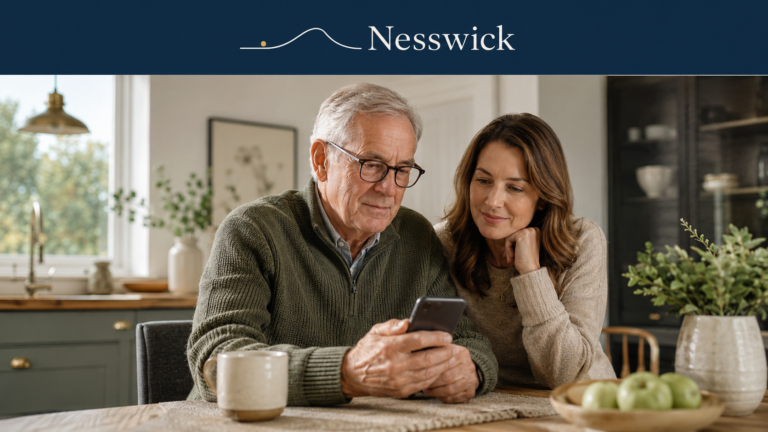 Adult daughter and older father reviewing a suspicious phone call together